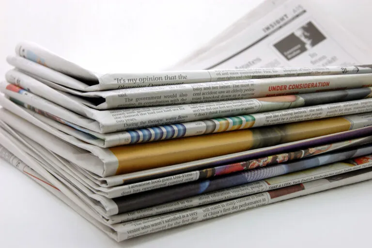 Newspapers folded and stacked